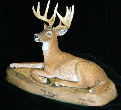 wooden deer sculpture